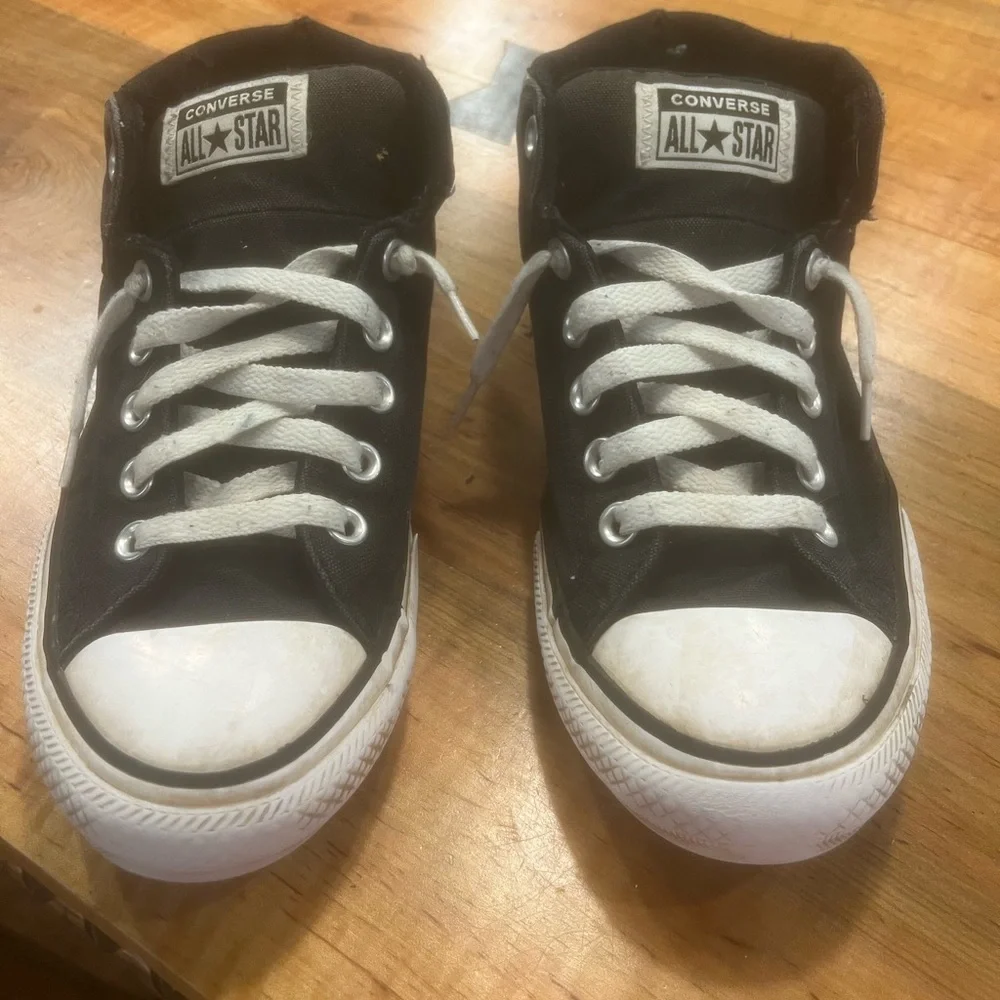 Converse Black and White High-Top Sneakers with Iconic Design